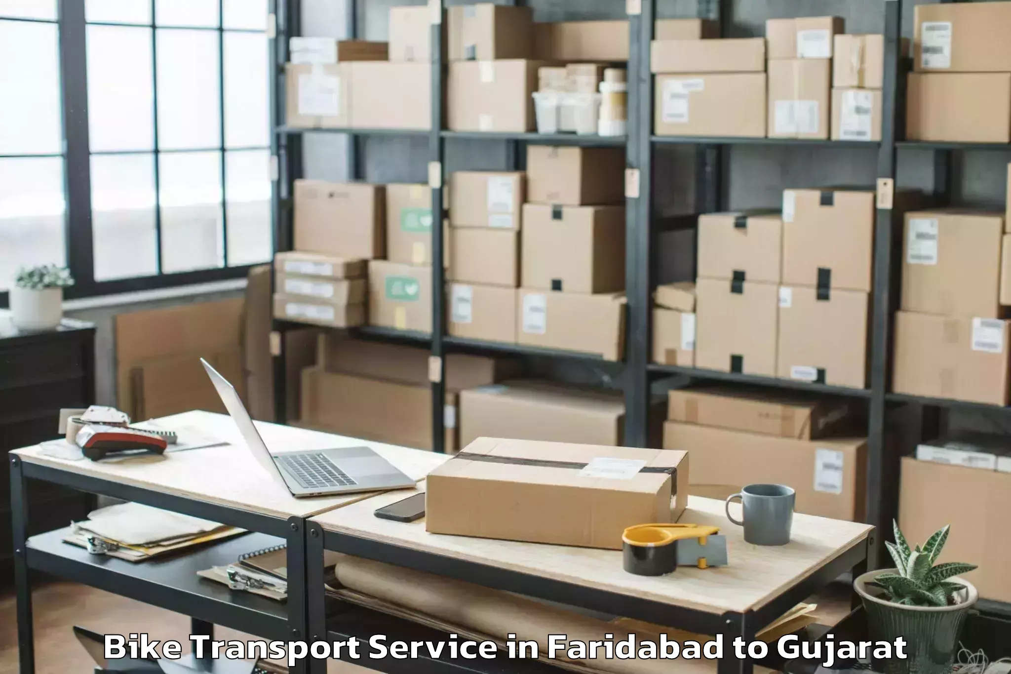 Book Your Faridabad to Indus University Ahmedabad Bike Transport Today